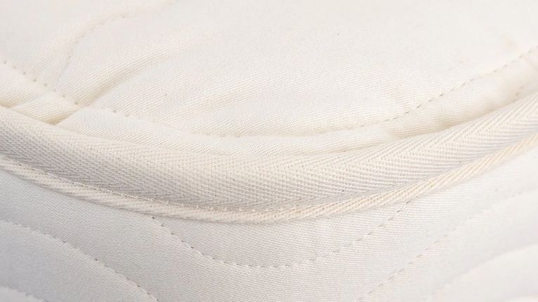 cream-colored mattress corner