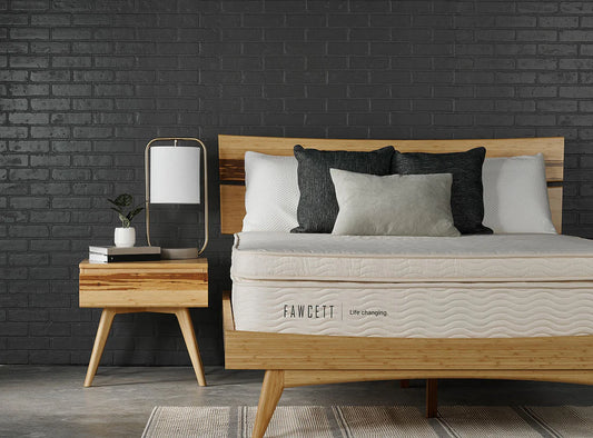 Galiano 11" Natural Latex Mattress (M2) styled in bedroom with bamboo furniture