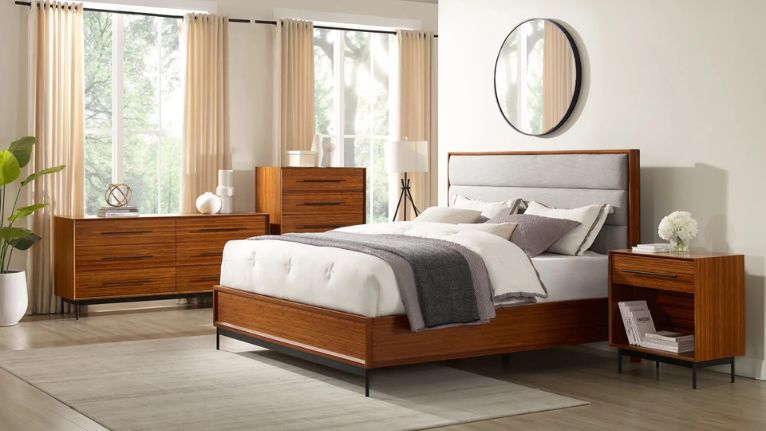 Modern bedroom with wooden furniture and neatly made bed