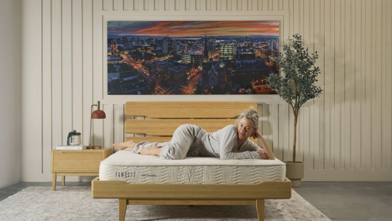 Woman relaxing on a Fawcett mattress