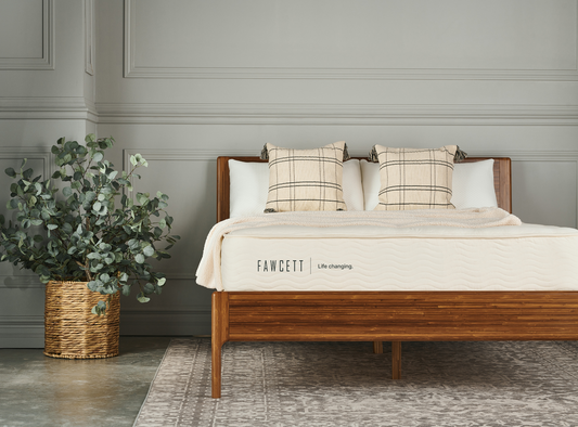 Qualicum 11" Flippable Hybrid Latex Mattress (M8) front view of styled in bedroom with bamboo furniture 